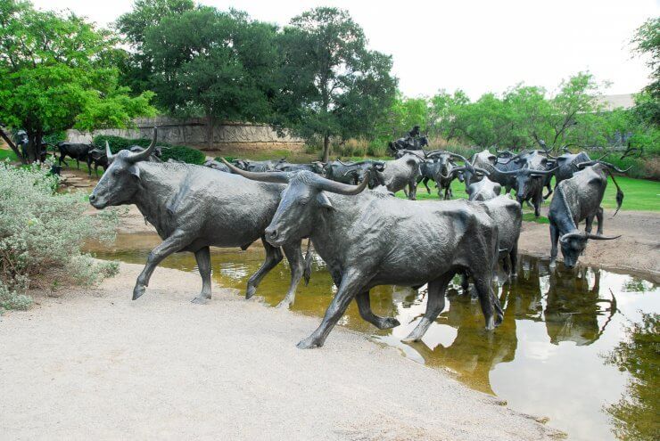 Cattle Drive Sculptures in Pioneer Plaza in Dallas, Texas is a great place to begin a day exploring Dallas. 